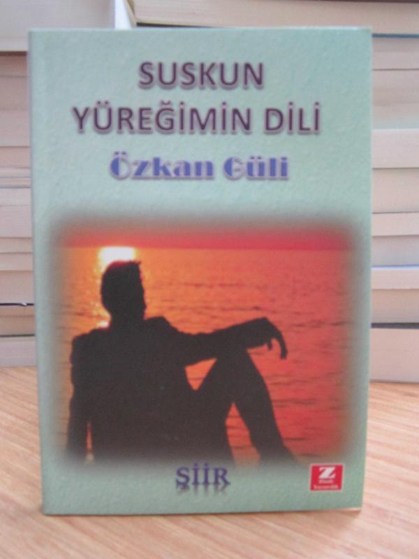 Suskun Yüreğimin Dili - Özkan Güli